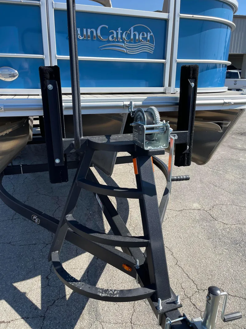 Slide: The Image of 2024 SunCatcher 322rc boat trailer hitch and winch system. - 7