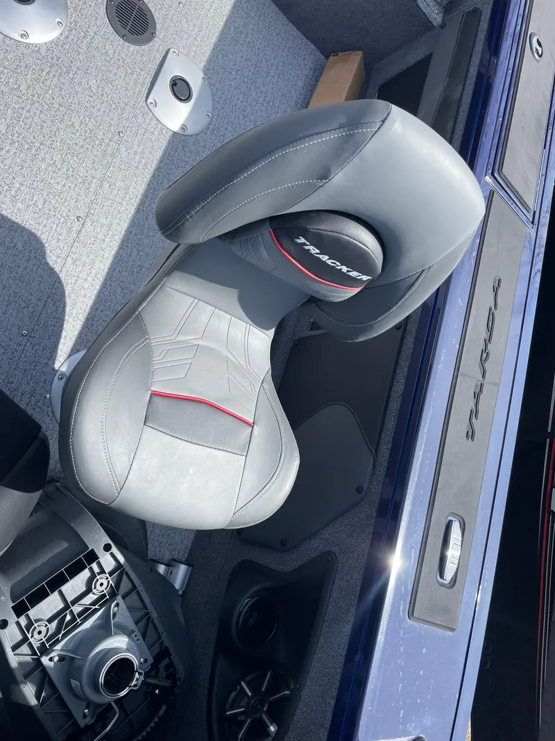 Slide: The Image of 2024 Tracker Targa V-19 Combo boat interior with a gray seat. - 12