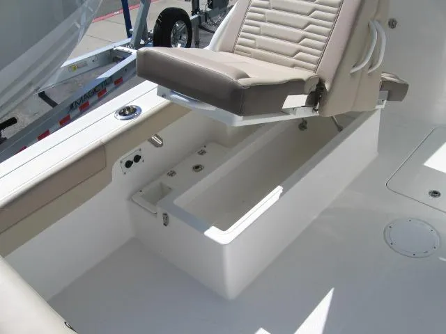 Slide: The Image of 2024 Edgewater 245CX boat seat with storage compartment. - 4