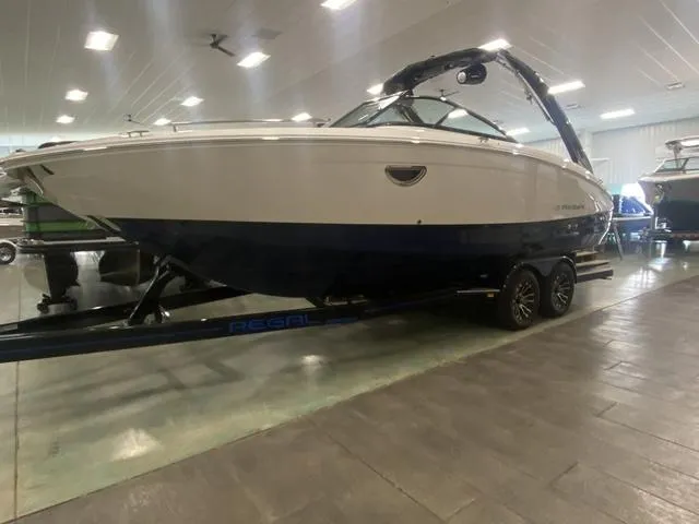 Slide: The Image of 2024 Regal LS6 boat with up to $10,000 savings offer. - 1