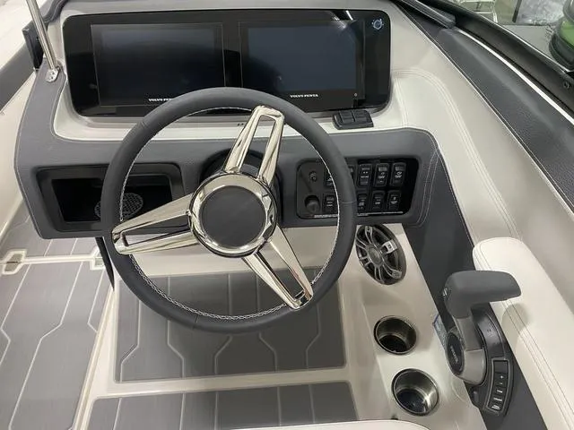 Slide: The Image of 2024 Regal LS6 boat bathroom with sink, toilet, and storage compartment. - 21