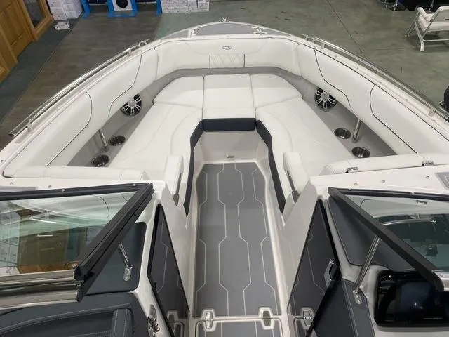 Slide: The Image of 2024 Regal LS6 boat interior with modern seating and sleek design. - 22