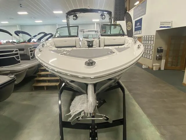 Slide: The Image of 2024 Regal LS6 boat on display in showroom. - 5