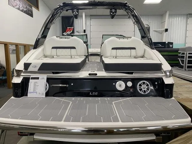 Slide: The Image of 2024 Regal LS6 boat bow with anchor and bubble wrap packaging. - 7