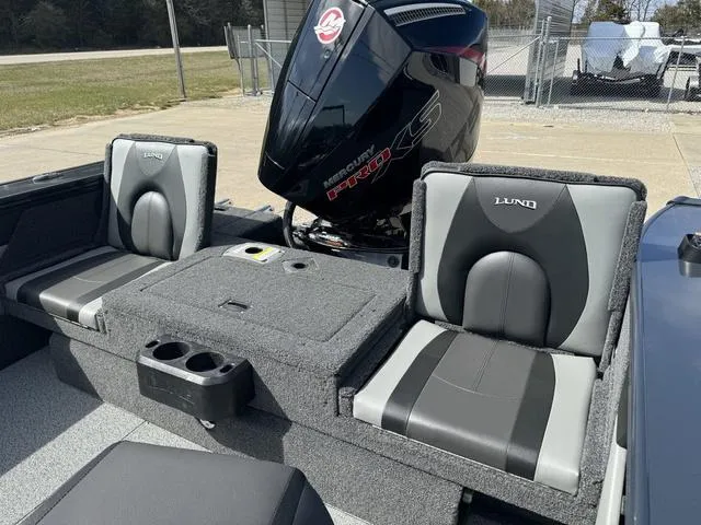 Slide: The Image of 2024 Lund 1875 Crossover XS Sport boat interior with Mercury Pro XS engine. - 8