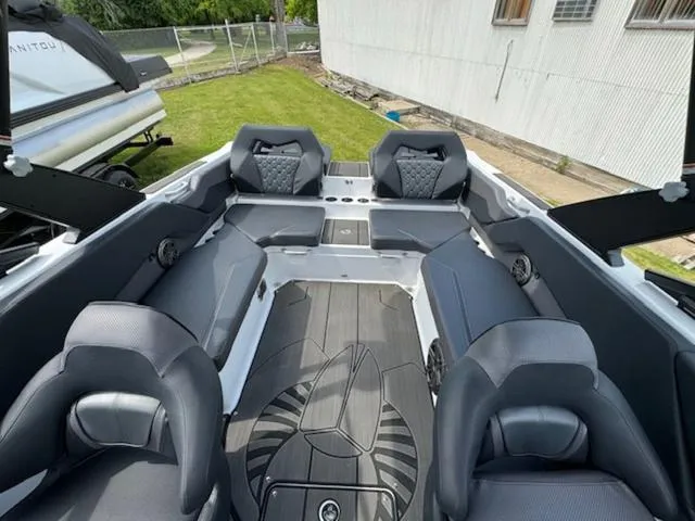 Slide: The Image of 2025 Scarab 235 Wake boat interior with modern seating and sleek design. - 14