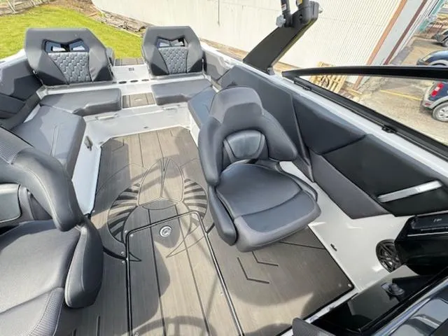 Slide: The Image of 2025 Scarab 235 Wake boat interior with modern seating and sleek design. - 17