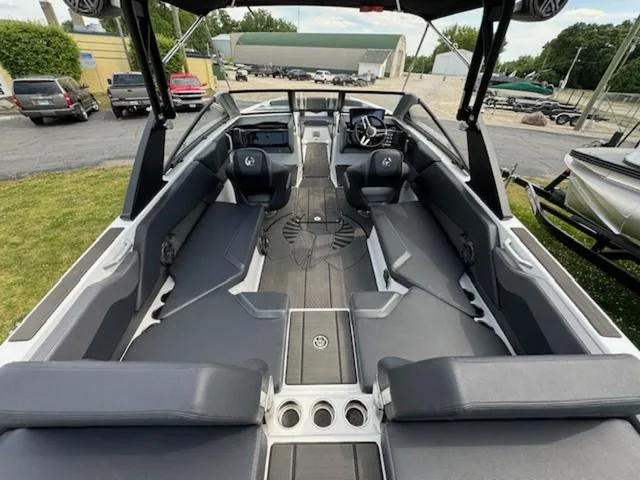 Slide: The Image of 2025 Scarab 235 Wake boat interior with spacious seating and modern design. - 8