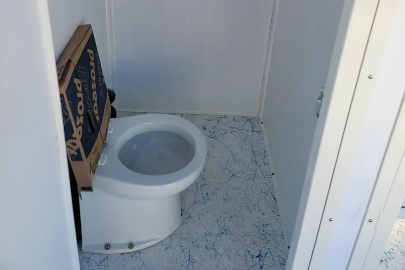 Slide: The Image of Portable toilet interior of A&M Manufacturing BullDog 30, 2024 model. - 14
