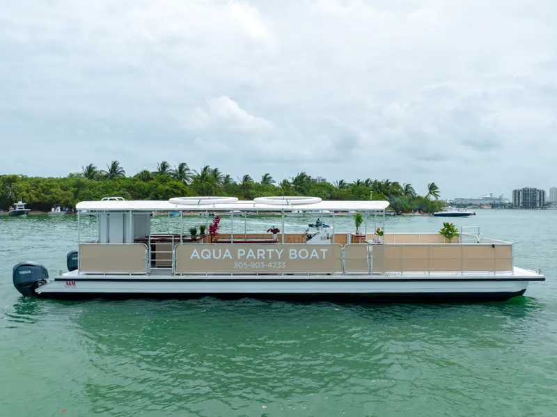 The Image of 2024 A&M Manufacturing BullDog 50 Aqua Party Boat on water. - 0