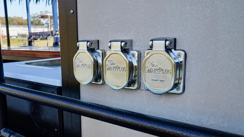 Slide: The Image of A&M Manufacturing BullDog 50 2024 model with SmartPlug outlets. - 18