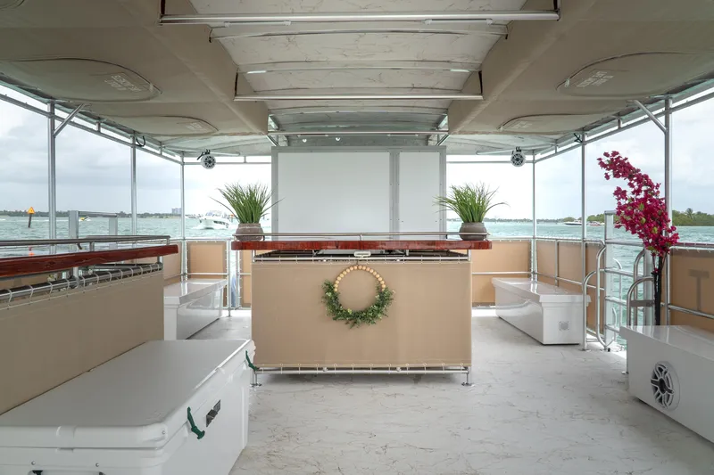 Slide: The Image of Interior of 2024 A&M Manufacturing BullDog 50 boat with modern decor and ocean view. - 6