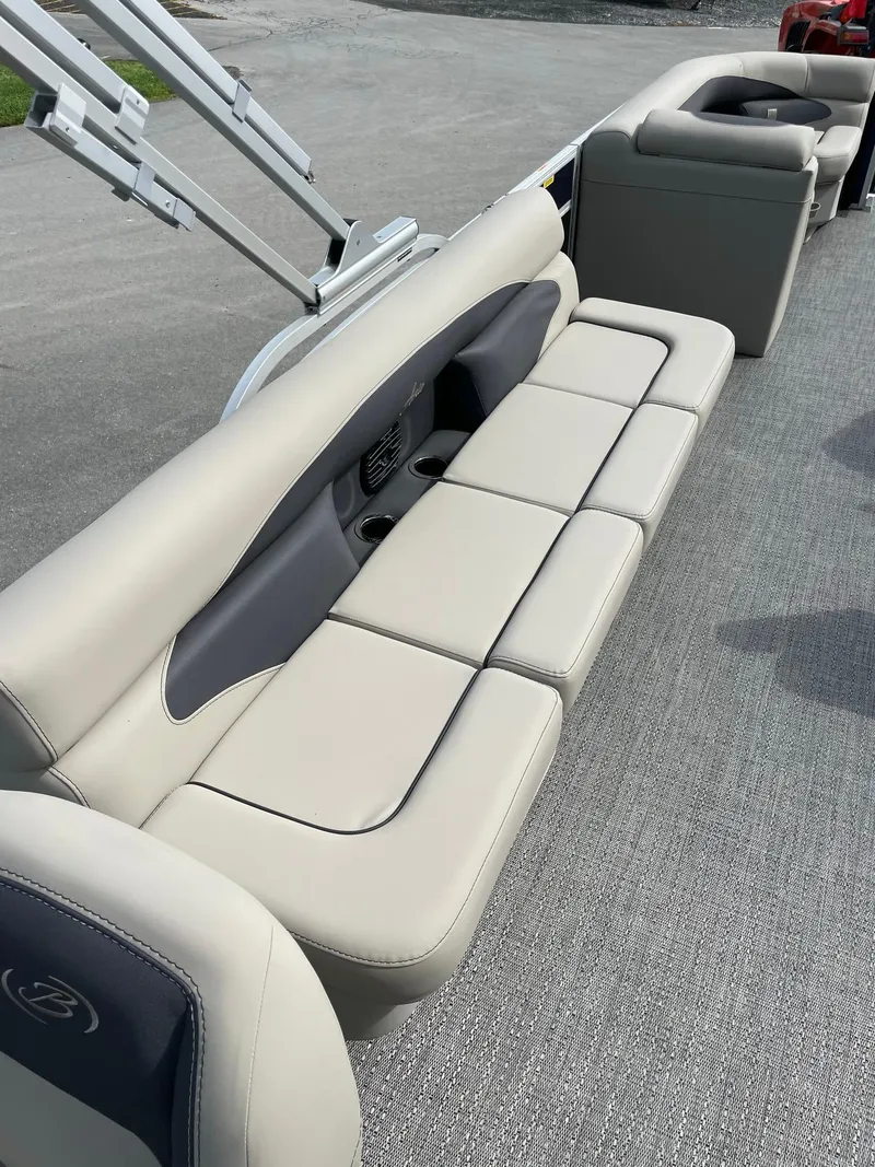 Slide: The Image of 2024 Barletta Aria 22CC boat with luxurious beige seating. - 15