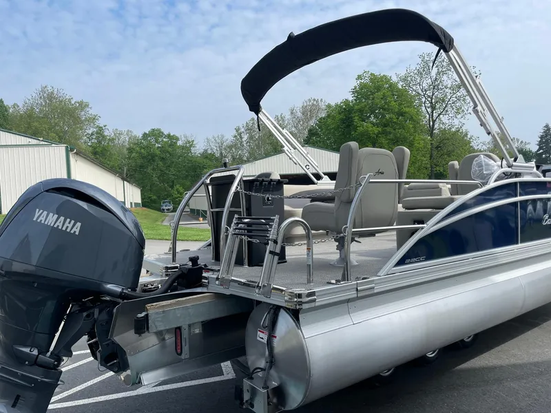 Slide: The Image of 2024 Barletta Aria 22CC pontoon boat with Yamaha outboard motor. - 4