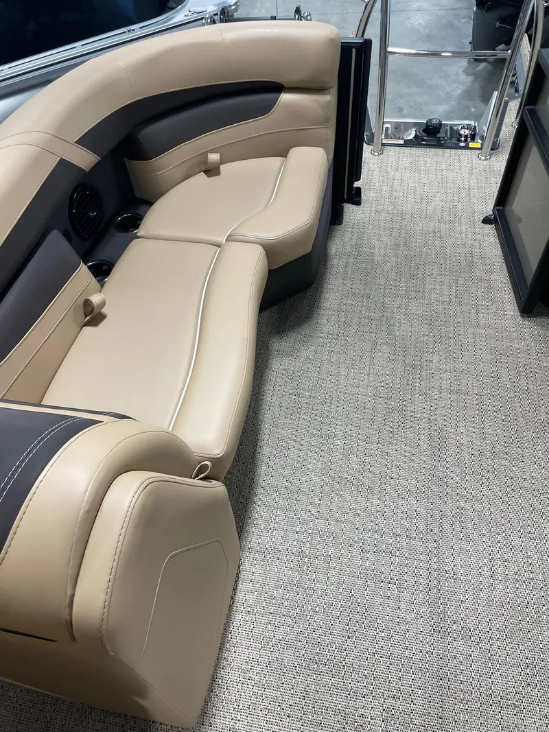 Slide: The Image of 2024 Barletta Cabrio 22Q interior with beige and black seating. - 15