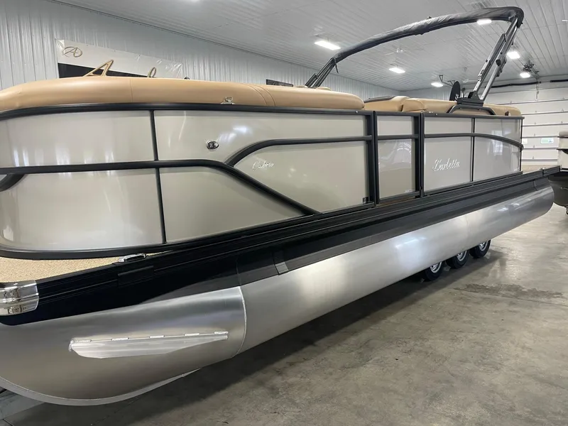 Slide: The Image of 2024 Barletta Cabrio 22Q pontoon boat in showroom. - 6