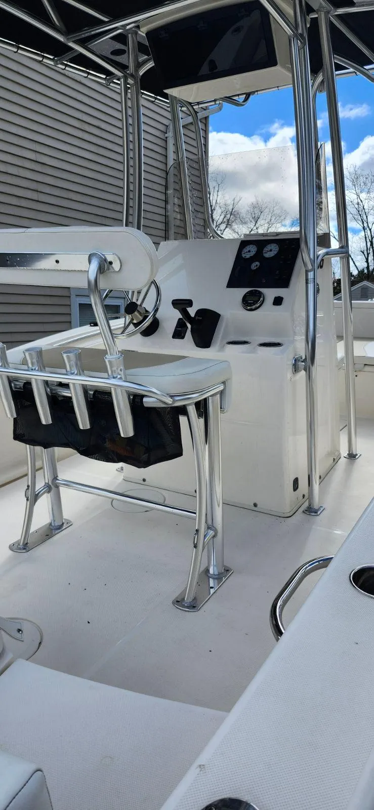 Slide: The Image of 2021 Bulls Bay 200 CC boat interior with steering console and seating. - 16