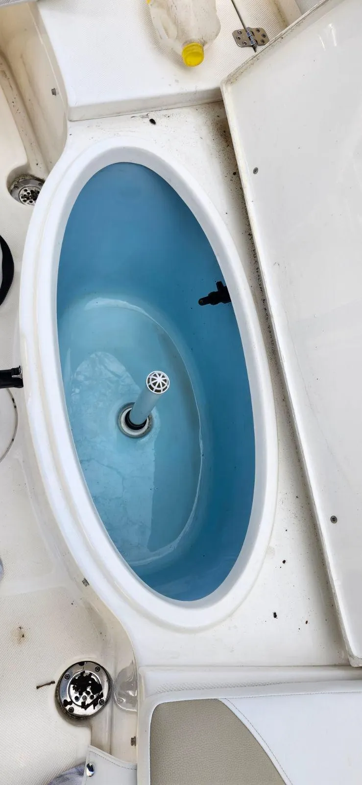 Slide: The Image of Livewell on a 2021 Bulls Bay 200 CC boat, featuring a blue interior. - 17