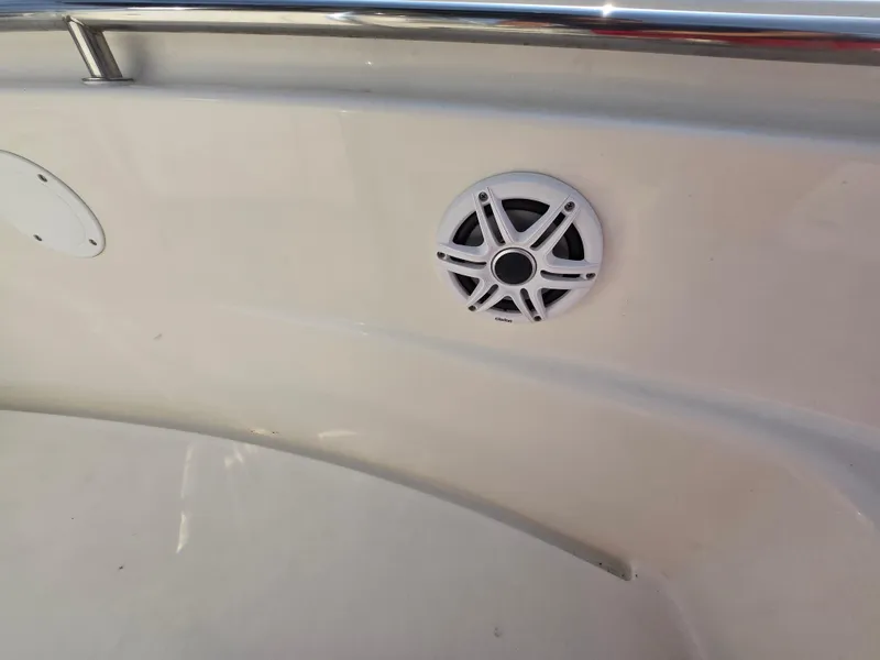 Slide: The Image of 2021 Bulls Bay 200 CC boat interior with speaker and railing detail. - 27
