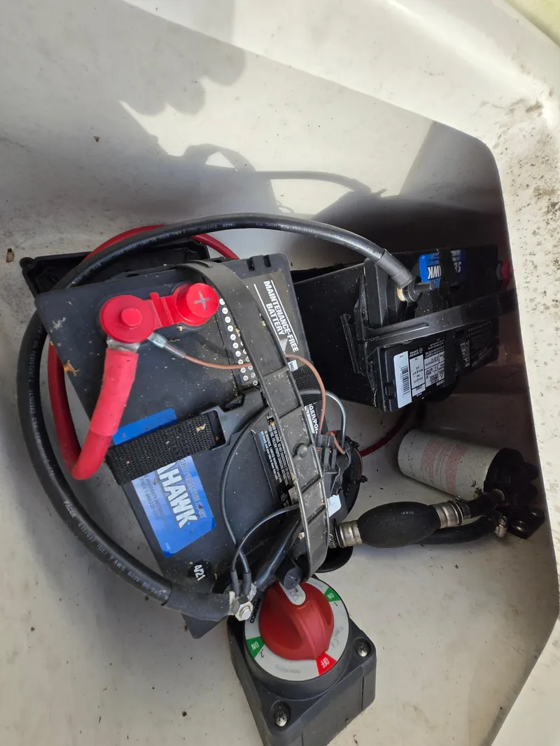 Slide: The Image of Battery compartment of a 2021 Bulls Bay 200 CC boat with wiring and components. - 32