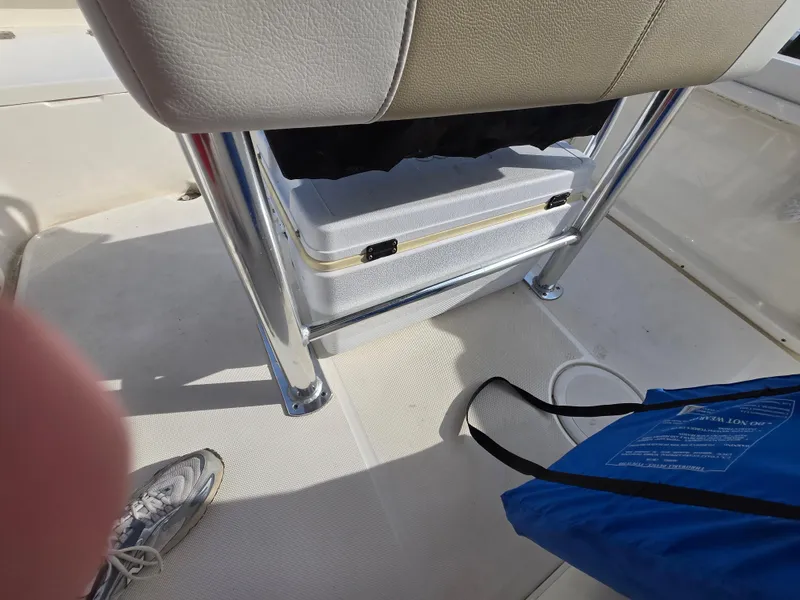 Slide: The Image of Interior of a 2021 Bulls Bay 200 CC boat showing seating and storage area. - 35