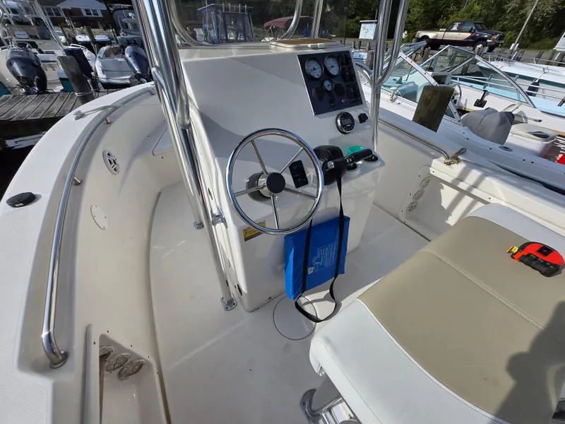 Slide: The Image of 2021 Bulls Bay 200 CC boat interior with steering wheel and control panel. - 40