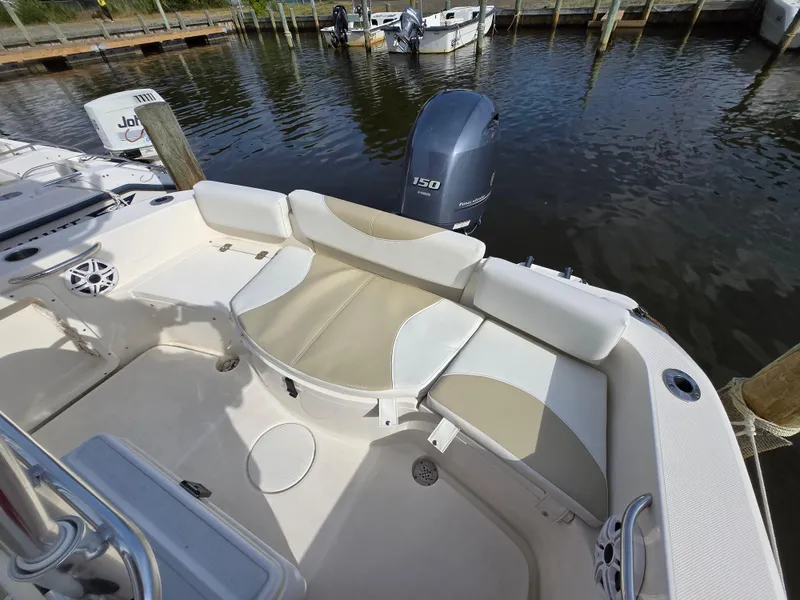 Slide: The Image of 2021 Bulls Bay 200 CC boat with Yamaha 150 engine, docked in a marina. - 42