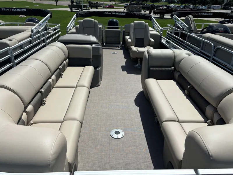 Slide: The Image of 2024 Sun Tracker Party Barge 24 DLX interior with spacious seating and modern design. - 10