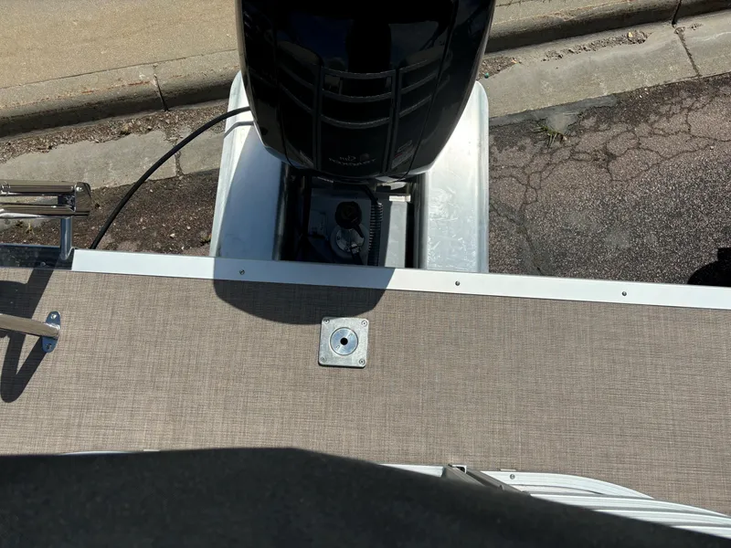 Slide: The Image of Sun Tracker Party Barge 24 DLX 2024 - rear deck and outboard motor. - 12