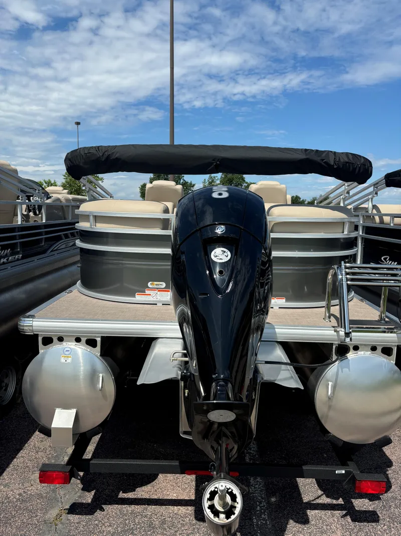 Slide: The Image of 2024 Sun Tracker Party Barge 24 DLX pontoon boat with outboard motor. - 5
