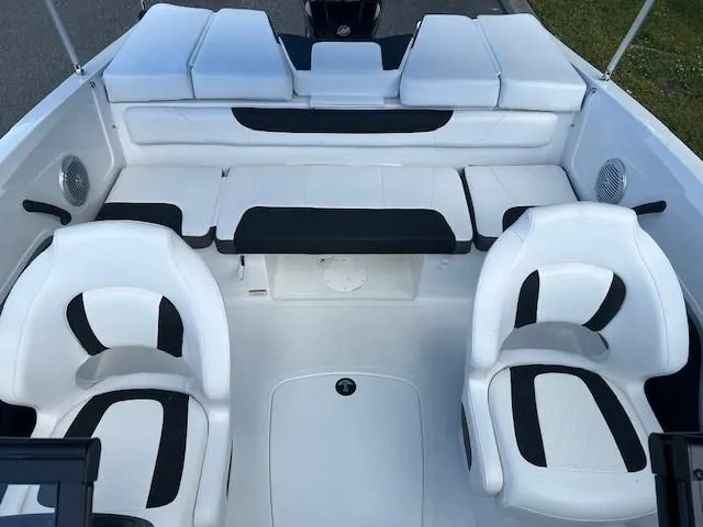Slide: The Image of 2024 Tahoe 185 S boat interior with white and black seating. - 8