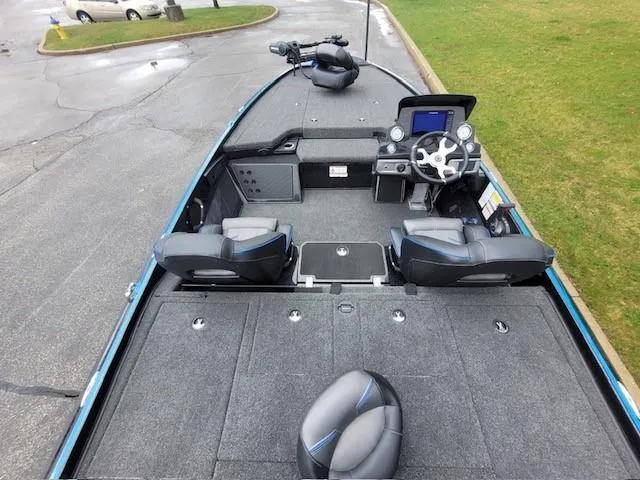 Slide: The Image of 2024 Nitro Z19 Pro fishing boat interior with dual seats and advanced navigation system. - 6