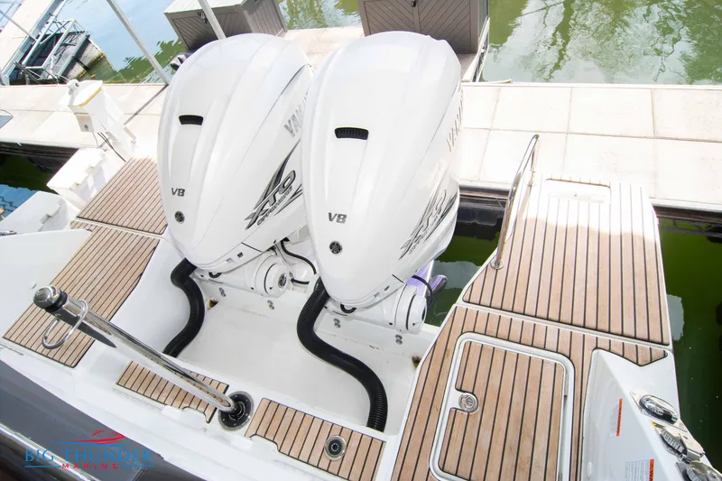 Slide: The Image of 2024 Jeanneau Leader 10.5 WA with twin V8 engines at dock. - 11