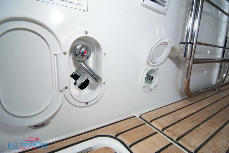 Slide: The Image of Control panel and deck of 2024 Jeanneau Leader 10.5 WA boat. - 12