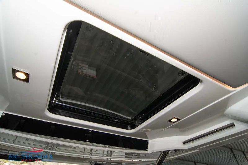 Slide: The Image of 2024 Jeanneau Leader 10.5 WA sunroof and interior lighting. - 29