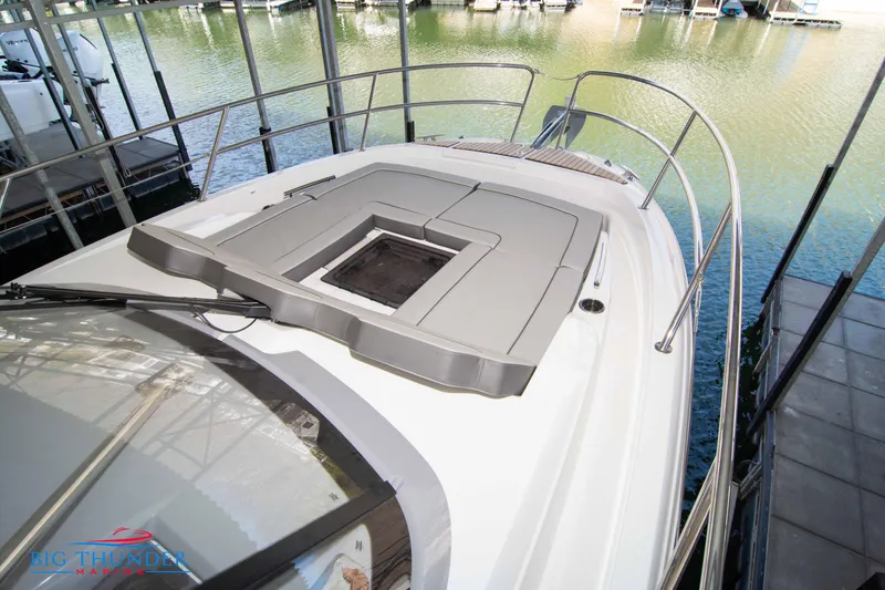 Slide: The Image of 2024 Jeanneau Leader 10.5 WA boat deck with cushioned seating. - 49