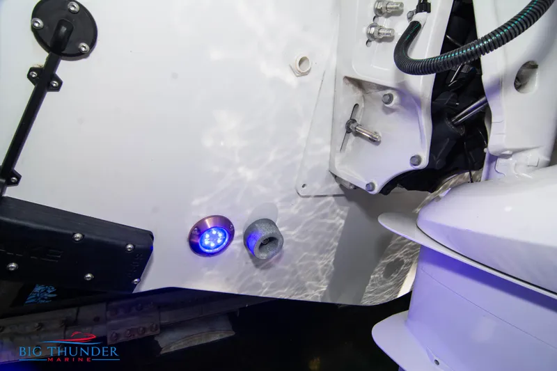 Slide: The Image of 2024 Jeanneau Leader 10.5 WA boat stern with underwater lights. - 6