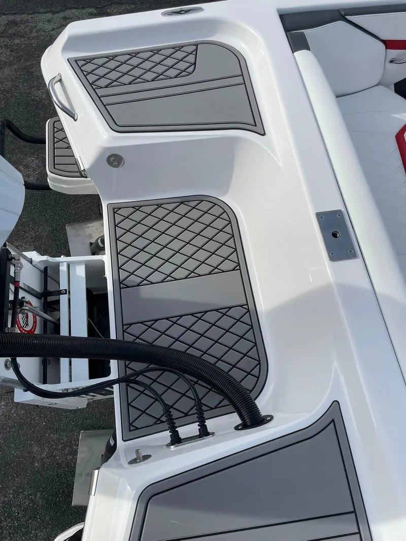 Slide: The Image of 2025 Checkmate Pulsare 2400 BRX boat interior with sleek design and modern features. - 9