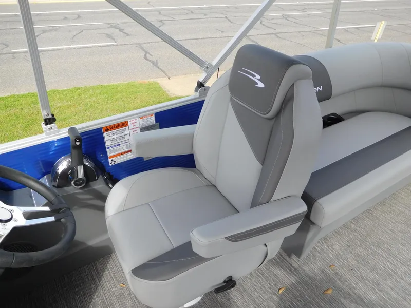 Slide: The Image of 2024 Bennington 20 SVSR boat captain's chair and helm station. - 3
