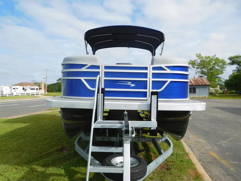 Slide: The Image of 2024 Bennington 20 SVSR pontoon boat on trailer, front view. - 8