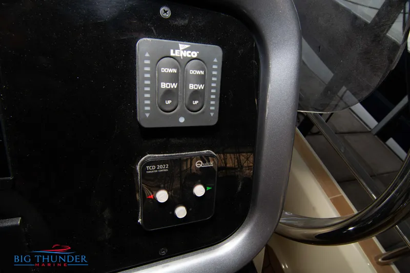 Slide: The Image of Control panel of 2024 Invictus GT370S boat with Lenco and Quick systems. - 31
