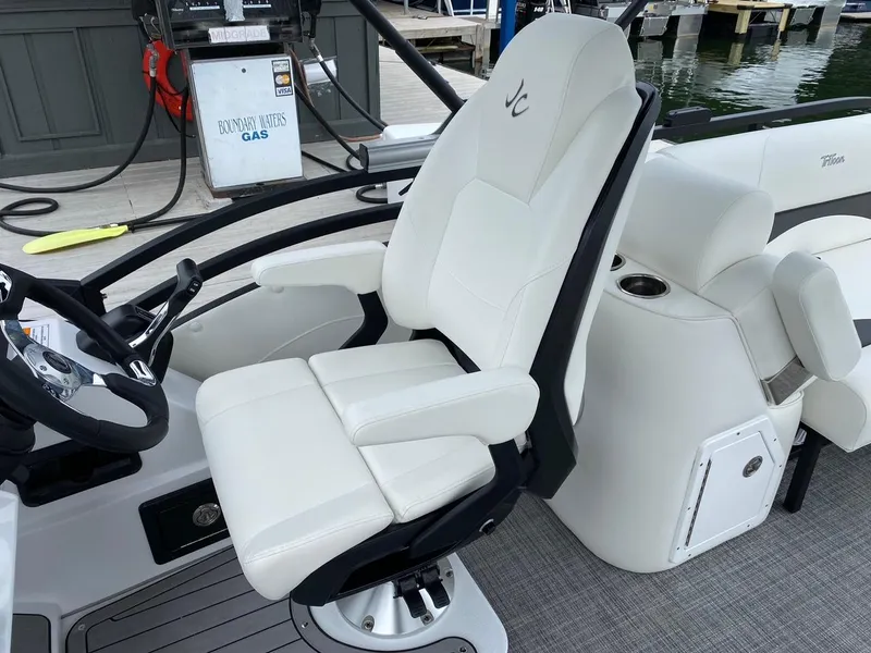 Slide: The Image of 2024 JC Neptoon Sport 23TT DSL boat captain's chair and helm station. - 15