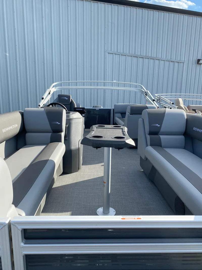 Slide: The Image of 2024 Bennington 20S pontoon boat with spacious seating and modern design. - 3