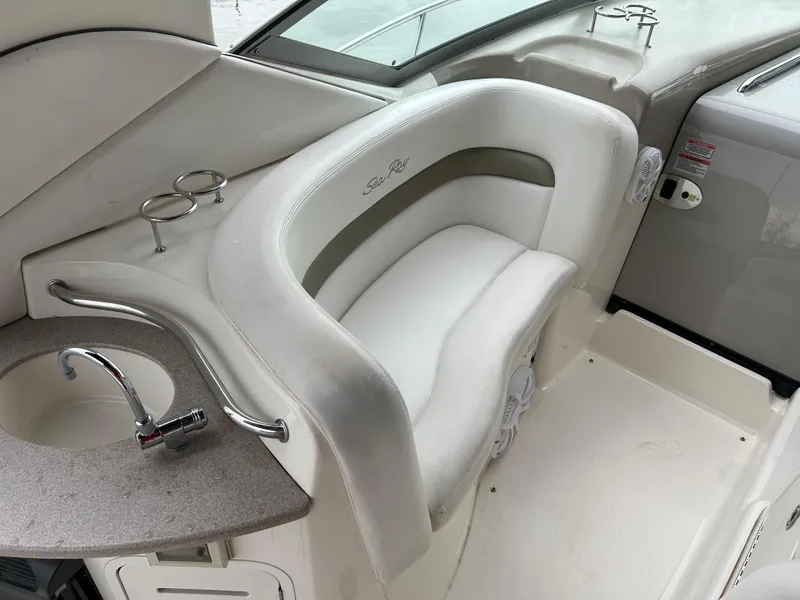 Slide: The Image of 2007 Sea Ray 320 Sundancer bathroom with sink, toilet, and wooden flooring. - 20