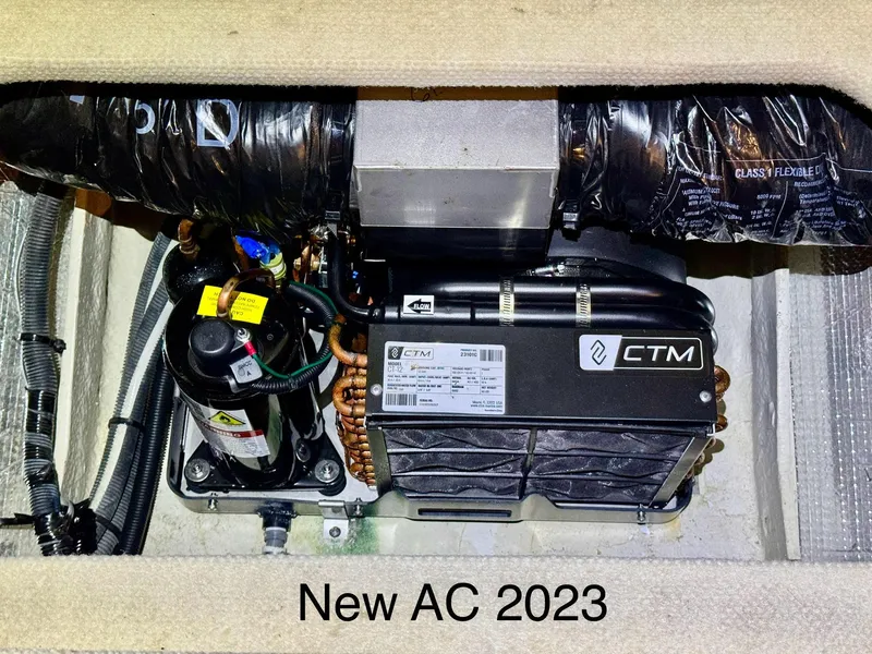 Slide: The Image of New 2023 AC unit in 2007 Sea Ray 320 Sundancer boat. - 9