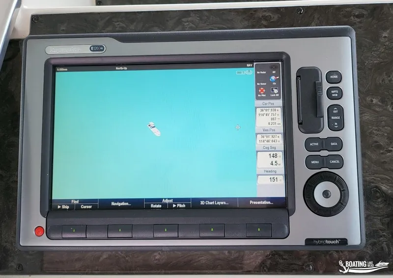 Slide: The Image of Raymarine E120W navigation system on a 2012 Sea Ray 450 Sundancer. - 19