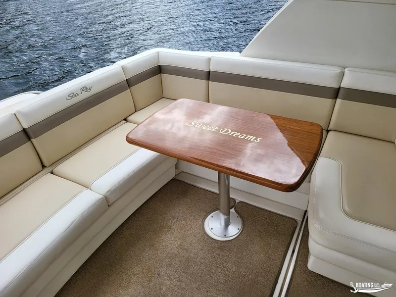 Slide: The Image of Luxurious seating area on 2012 Sea Ray 450 Sundancer yacht with Sweet Dreams table. - 20