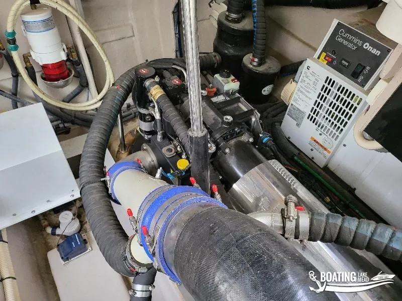 Slide: The Image of Engine compartment of a 2012 Sea Ray 450 Sundancer with Cummins Onan generator. - 38