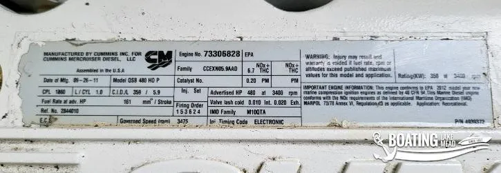 Slide: The Image of 2012 Sea Ray 450 Sundancer engine specifications label by Cummins Mercruiser Diesel. - 43