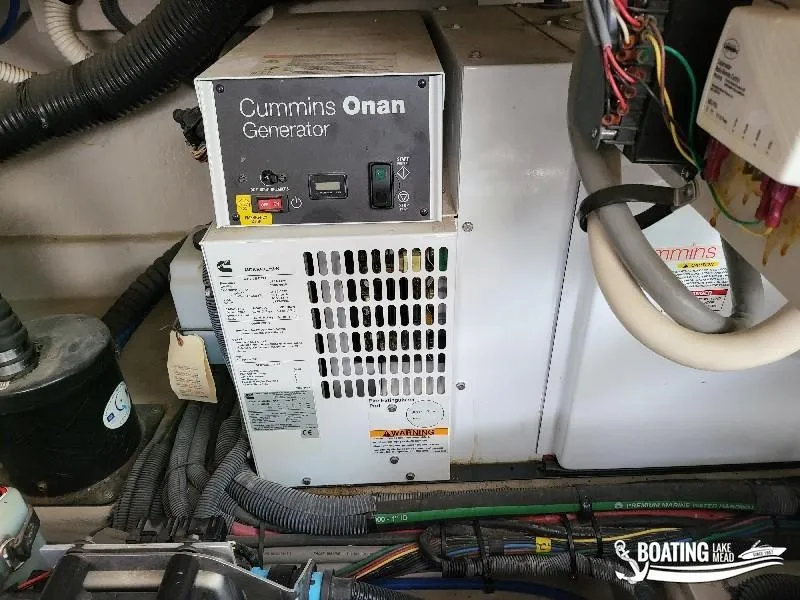 Slide: The Image of Cummins Onan generator in the engine room of a 2012 Sea Ray 450 Sundancer yacht. - 44
